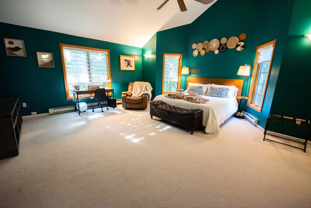 Master bedroom with teal walls