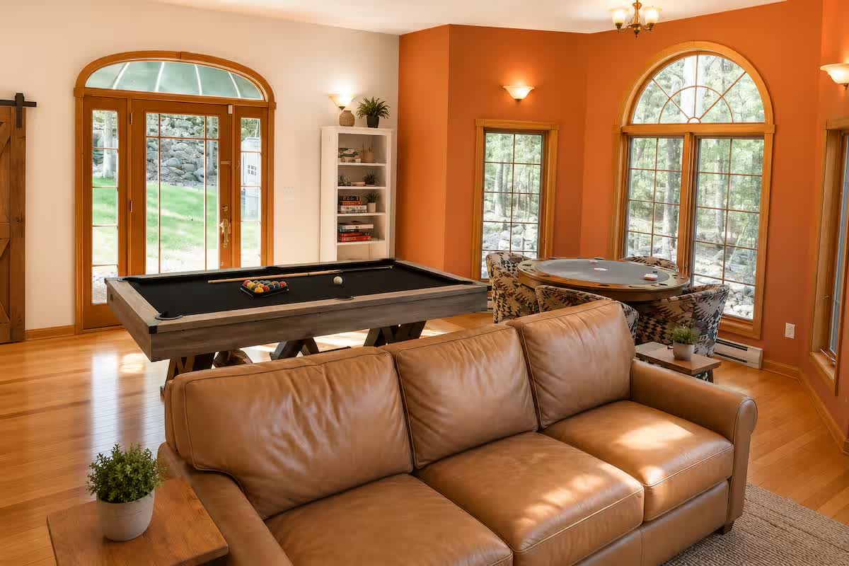 Game room with pool table and card table